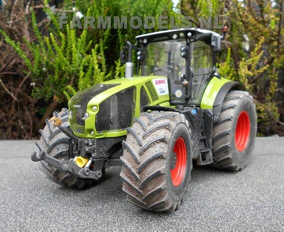 421. Claas Axions 900 serie op brede banden