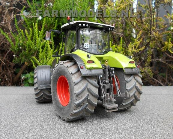 421. Claas Axions 900 serie op brede banden