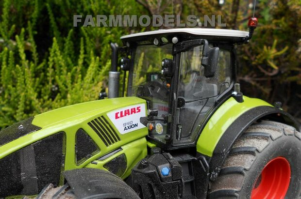 421. Claas Axions 900 serie op brede banden