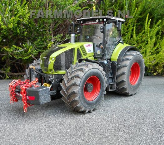 421. Claas Axions 900 serie op brede banden