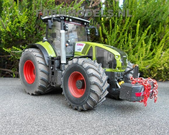 421. Claas Axions 900 serie op brede banden