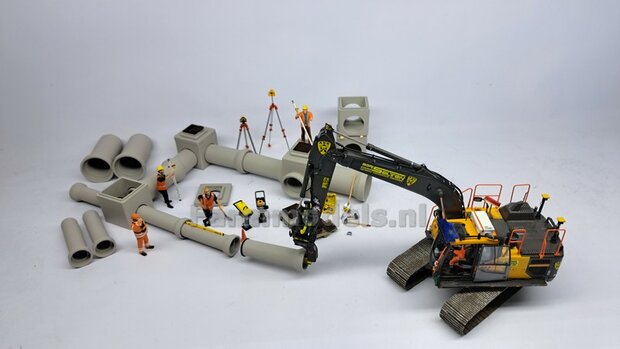 BOUWKIT: VERACHTERT (RIOOL-) BUIZENLEGGER  Beweegbaar met S70 Koppeling. Materiaal: Resin op KLEUR Gespoten geleverd incl. Verachtert Pr&eacute;-Cut Stickers geleverd 1:32  