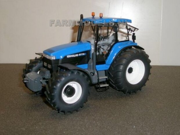 545. New Holland 8770A op bredere banden met bouwkit cultivator Lemken / Evers