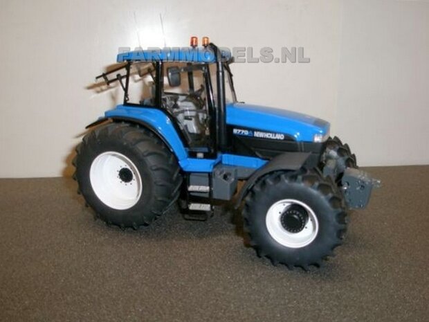 545. New Holland 8770A op bredere banden met bouwkit cultivator Lemken / Evers