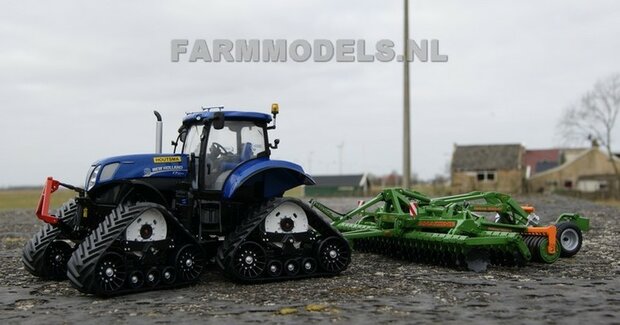 545. New Holland  op bredere rups onderstellen