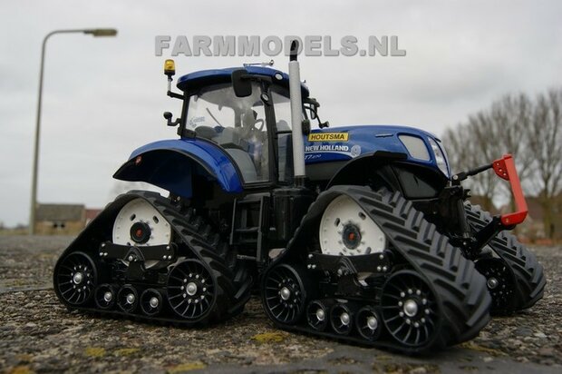 545. New Holland  op bredere rups onderstellen