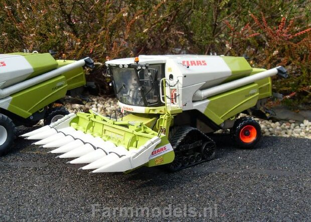 409. Claas Tucano (eventueel op rupsen) met kolvenplukker