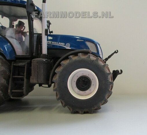 545. New Holland  op bredere banden met aluminium velgen